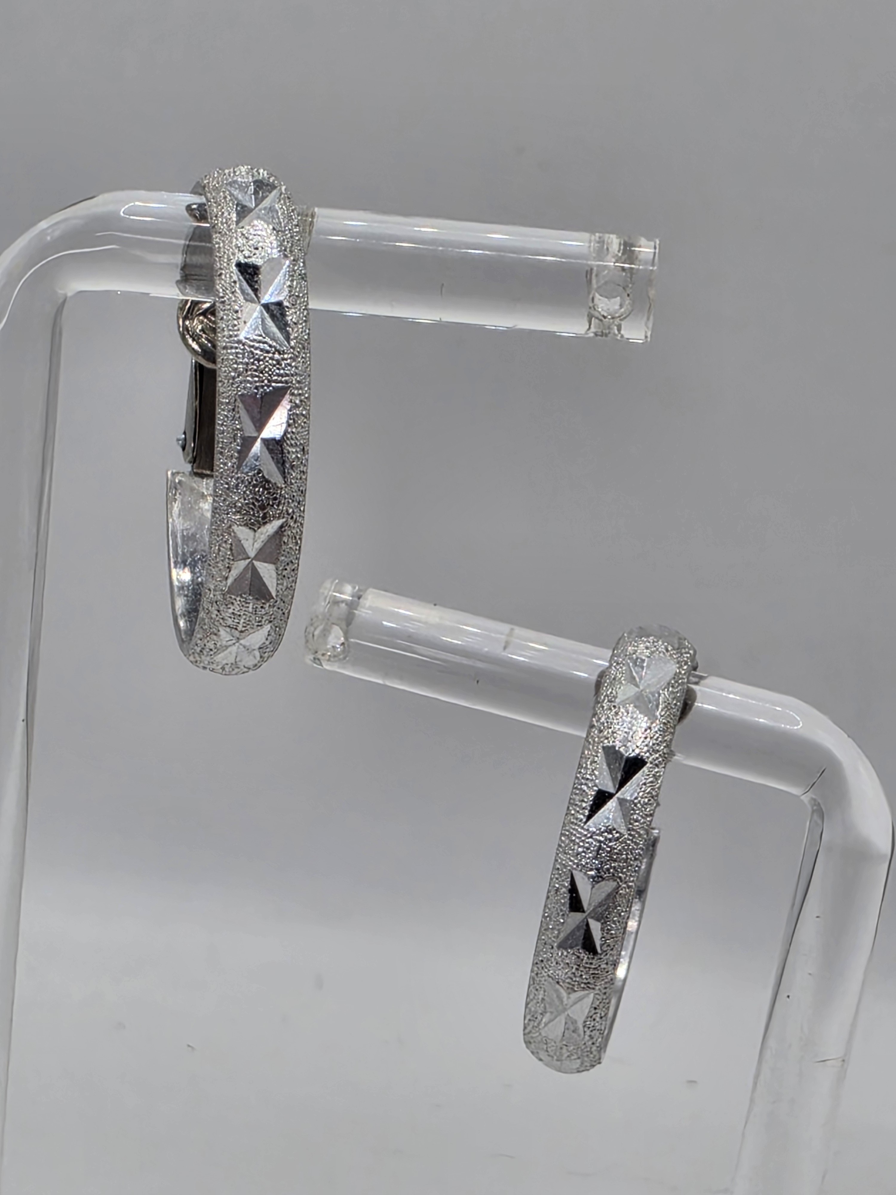 Wells Silver Toned Textured Diamond Cut Harlequin Finish Hoops Clip On Earrings